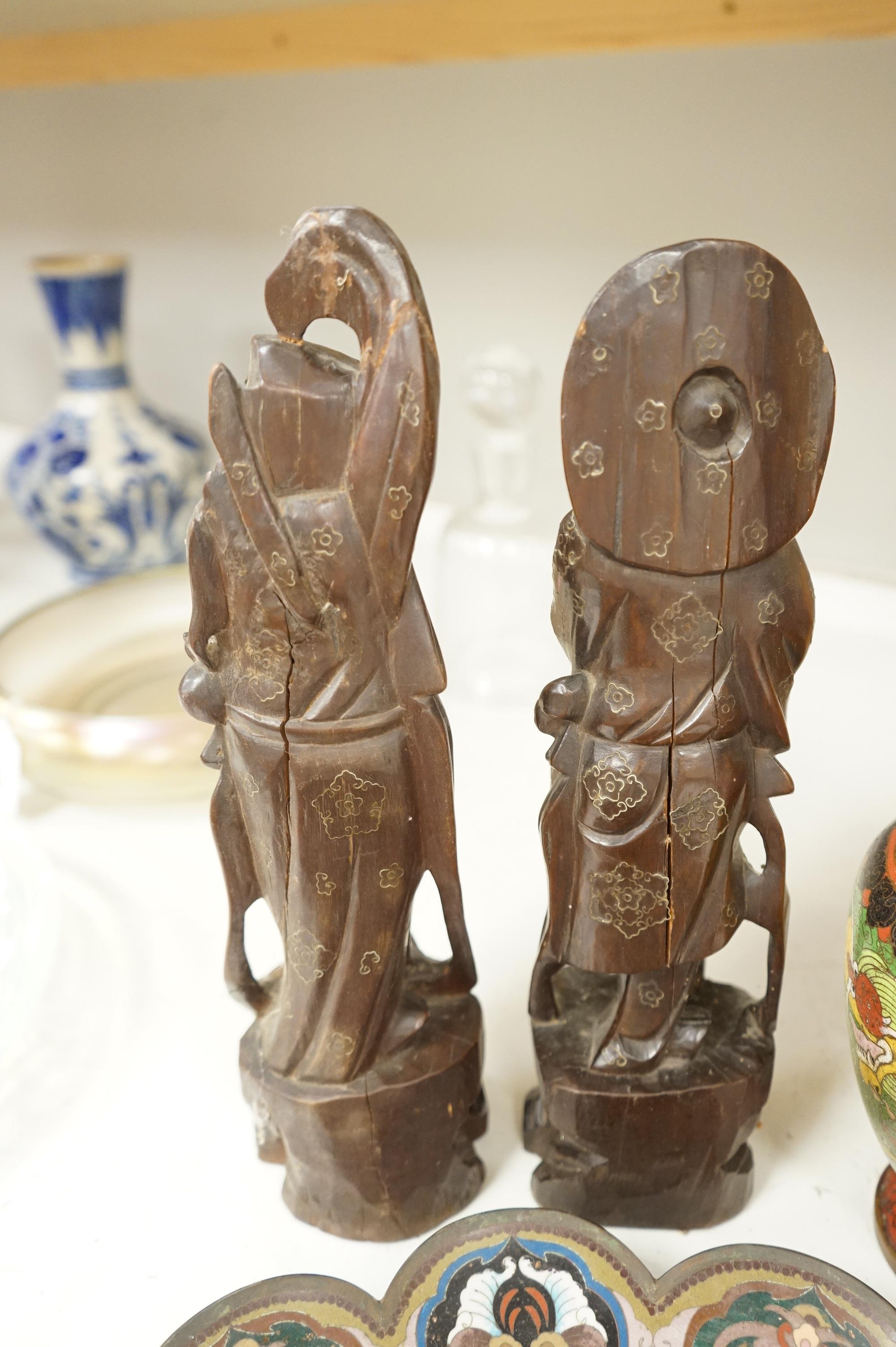A Japanese cloisonné enamel dish, a Chinese cloisonné enamel vase and three Chinese carved wood figures, largest 39cm high